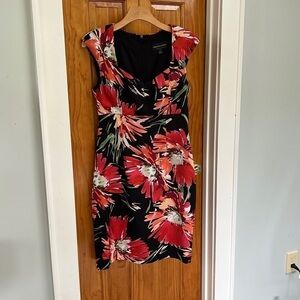 Connected Apparel Women's Sleeveless dress. Black with red daisies. Size 8.